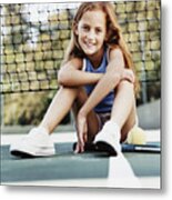 Portrait Of A Young Girl Sitting On A Tennis Court By The Net Metal Print