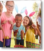 Portrait Of Five Children Wearing Bunny Ears On Easter Egg Hunt In Garden Metal Print