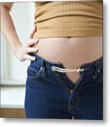 Pregnant Woman Bursting Out Of Jeans Metal Print