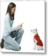 Profile Of A Young Woman Giving Instructions To Her Dog Metal Print