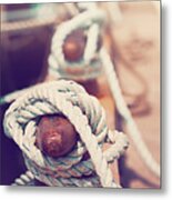 Quayside Cleats And Tied Ropes With Boats Moored In The Backgrou Metal Print