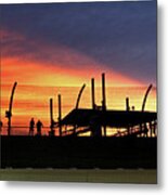Race Fans Silhouetted Against Sunset Metal Print