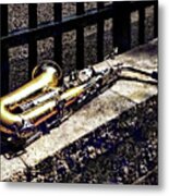 Saxophone On Wall Metal Print