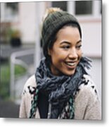 Smiling Young Woman Wearing Wooly Hat Outdoors Metal Print