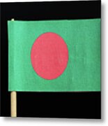 The National Flag Of Bangladesh On Toothpick On Black Background. A Red Disc On A Green Field Metal Print