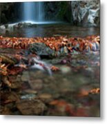 Waterfall And River Flowing With Maple Leaves On The Rocks On The River In Autumn Metal Print