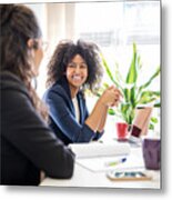Woman In Meeting With Coworker At Start Up Office Metal Print