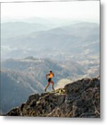 Woman Running On Mountain Metal Print
