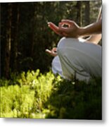 Woman Sitting In Meditating Position Outdoors, Low Angle View Metal Print