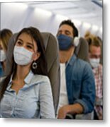 Woman Traveling By Plane Wearing A Facemask Metal Print