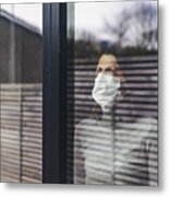 Woman With Mask Looking Out Of Window Metal Print