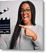 Young African American Director Girl Filming A Movie Using Clapboard Over Isolated Background Very Happy Pointing With Hand And Finger Metal Print