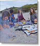 Young Man Putting Sausages On Smoking Grill Metal Print