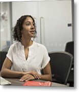 Young Woman Watching A Presentation In A Modern Office Metal Print