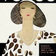 A Vintage Vogue Magazine Cover Of A Woman #1 Poster