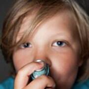 Child Using Asthma Inhaler #1 Poster