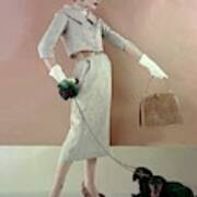 A Model Wearing A Tweed Jacket And Skirt Poster