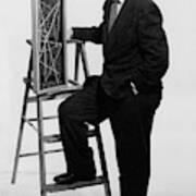 A Portrait Of Paul Mccobb Leaning On A Ladder Poster