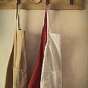 Aprons Hanging On Hooks With Vintage Feel Poster
