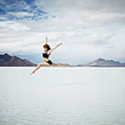 Ballerina Leaping In Mid-air Over Lake Poster