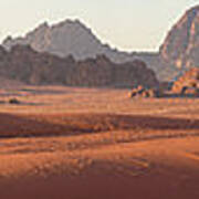 Bedouin Man Walking Across Wadi Rum Poster