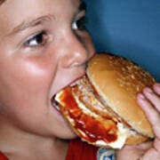 Boy Eating Cheeseburger Poster