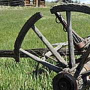 Broken Wagon Wheel And Log Building In Montana's Nevada City Poster