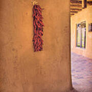 Chili Peppers On Adobe Wall Poster