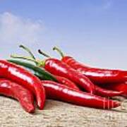 Chilli Peppers On Rustic Background Poster