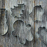 Holiday Cookie Cutters On Rustic Wood Background Poster