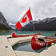 Lake Louise Canoes And Flag Poster