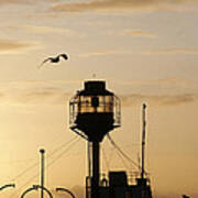 Light Ship Silhouette At Sunset Poster