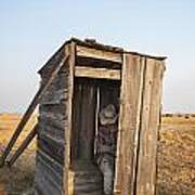 Mannequin Sitting In Old Wooden Outhouse Poster