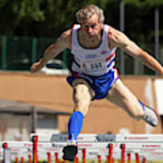 Masters British Athlete Clearing Hurdle Poster