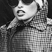Model Wearing Sunglasses And A Turban Poster