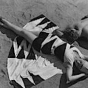 Models Lying On A Beach Poster