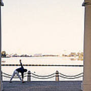 Person Stretching Near Colonnade, Lake Poster