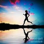 Silhouette Of Woman Running At Sunset Poster