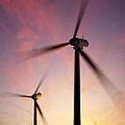 Wind Turbine Blades Spinning At Sunset Poster