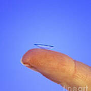 Contact Lens On A Fingertip #2 Poster