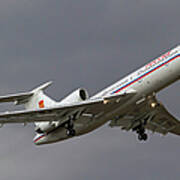 A Tupolev Tu-154m In Flight Poster