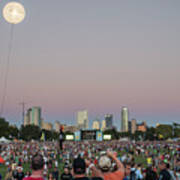 A Giant Acl Helium Ballon Lights Up The Night Sky During The Austin City Limits Music Festival Overlooking The Austin Skyline On October 12, 2014. Poster
