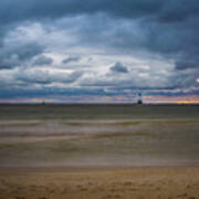 Lighthouse Under Brewing Clouds Poster