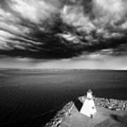 Storm Clouds Over A Lighthouse Poster