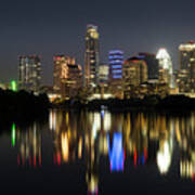 The Glimmering Austin Skyline Sparkles At Night With A View From The Boardwalk Trail On Lady Bird Lake Poster