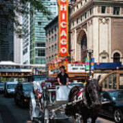 The Iconic Chicago Theater Sign And Traffic On State Street Poster
