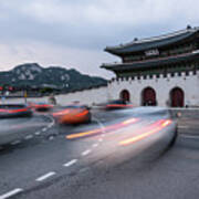 Traffic Rushing In Front Of The Gyeongbokgung Palace In Seoul Poster