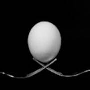 White Egg  Resting On Two Metal And Shiny Forks On A Black Backg #1 Poster