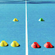 Colorful Plastic Cones On A Blue Cement Tennis Court With White  #2 Poster