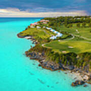 A Golf Course And A Hotel Near The Ocean In Bermuda Poster